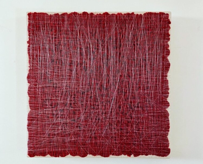 Abstract fiber artwork, square format, dark red fiber with fishing line randomly repeated across the surface.